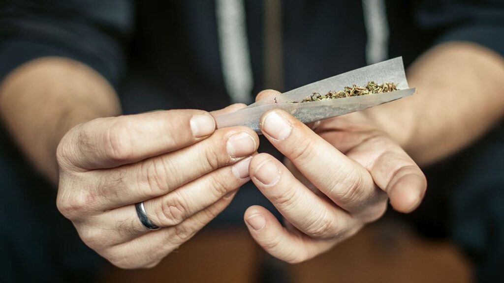 Preparing,And,Rolling,Marijuana,Cannabis,Joint.,Drugs,Narcotic,Concept